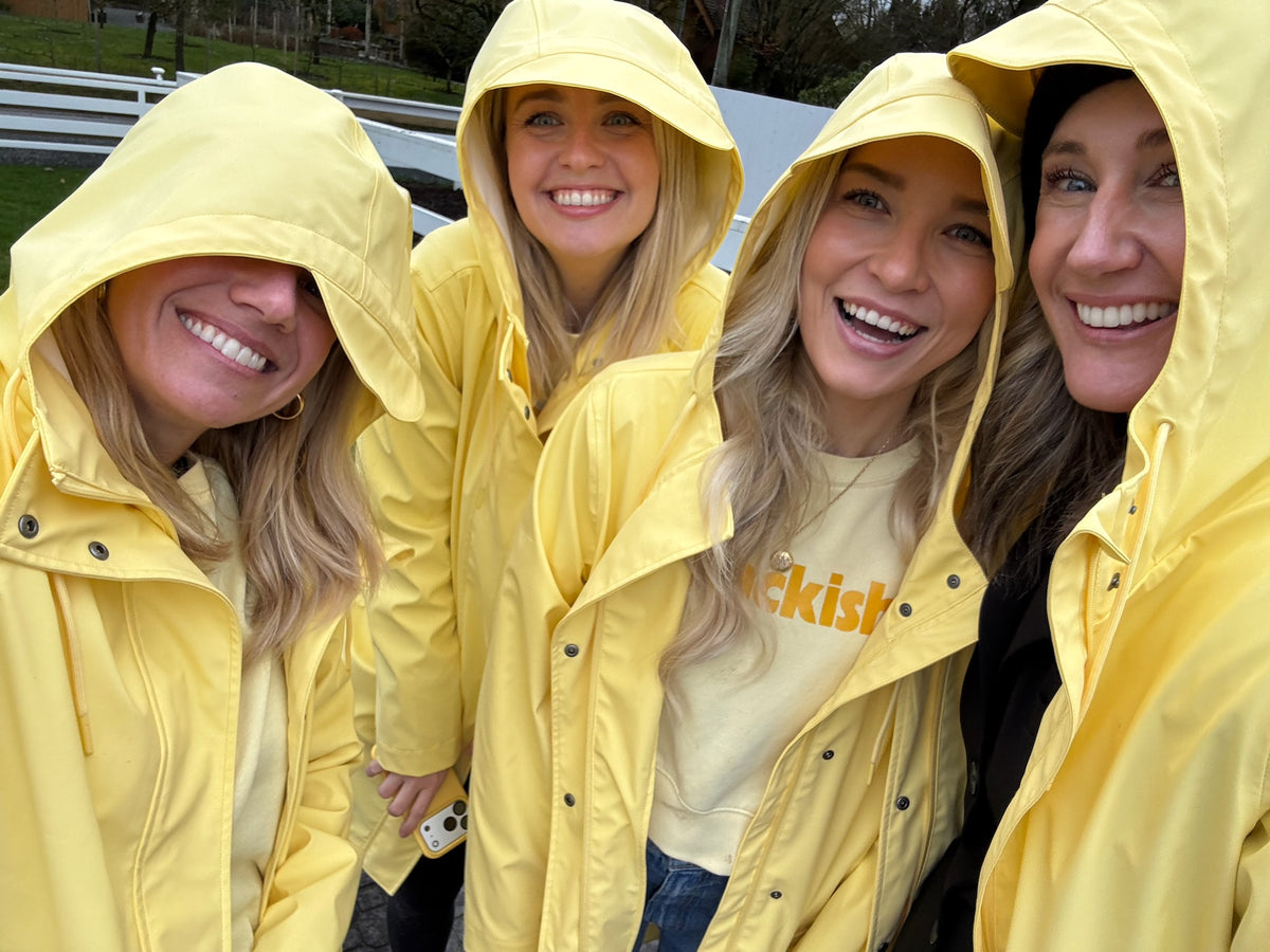 Snackish team in yellow rain jackets
